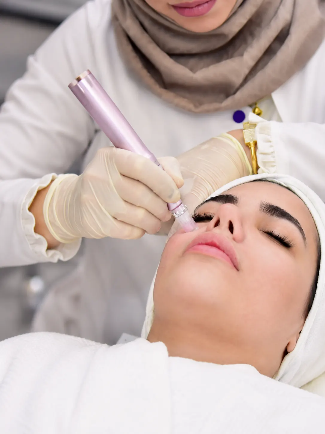 Skin care treatment with handheld device